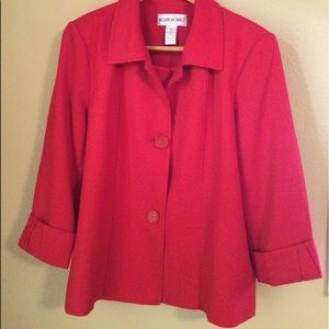 Red dressy jacket/blazer.3/4 sleeves. Cuff detail. Buttons.